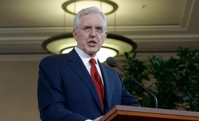 FILE - Elder D. Todd Christofferson of the Church's Quorum of the Twelve Apostles speaks during a news conference at the Conference Center, Jan. 27, 2015, in Salt Lake City. (AP Photo/Rick Bowmer, File)