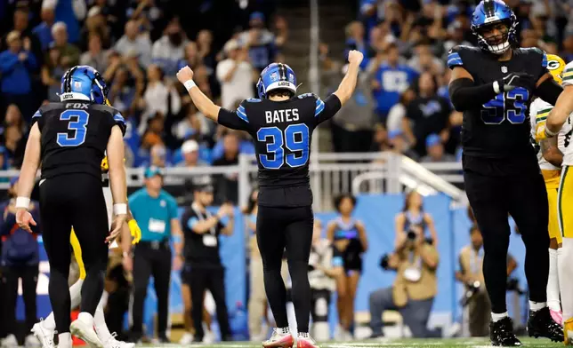 Detroit Lions kicker Jake Bates (39) celebrates after kicking a field goal on the final play of an NFL football game against the Green Bay Packers, Sunday, Oct. 25, 2026, in Detroit. (AP Photo/Rey Del Rio)