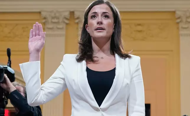 FILE - Cassidy Hutchinson, former aide to Trump White House chief of staff Mark Meadows, is sworn in before she testifies before the House select committee investigating the Jan. 6 attack, at the Capitol in Washington, June 28, 2022. (AP Photo/Jacquelyn Martin, File)