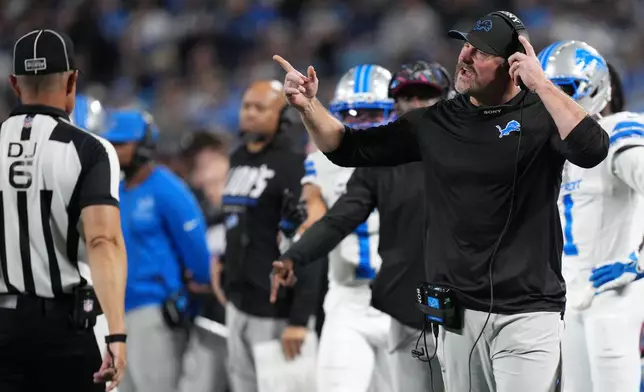 Detroit Lions head coach Dan Campbell gestures during an NFL football game against the Carolina Panthers in Charlotte, N.C., Sunday, Oct. 4, 2026. (AP Photo/Jacob Kupferman)