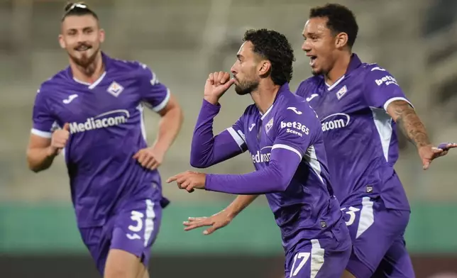 Fiorentina's Joao Mario, center, celebrates scoring during the Serie A soccer match between Fiorentina and Atalanta in Florence, Italy, Thursday, Oct. 29, 2026. (Massimo Paolone/LaPresse via AP)