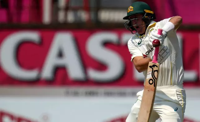 Australia's Marnus Labuschagne plays a high ball on day four of the first cricket test match between South Africa and Australia, in Durban, South Africa, Monday, Oct. 12, 2026. (AP Photo/Themba Hadebe)