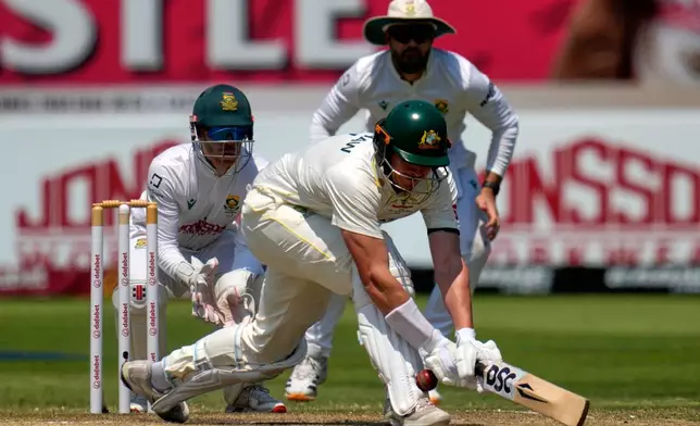 Australia's Matt Renshaw misplay a short ball on day four of the first cricket test match between South Africa and Australia, in Durban, South Africa, Monday, Oct. 12, 2026. (AP Photo/Themba Hadebe)