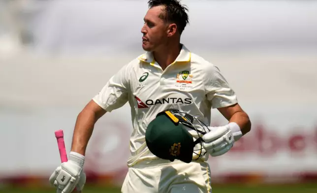 Australia's Marnus Labuschagne looks on as he leaves the field following his dismissal on day four of the first cricket test match between South Africa and Australia, in Durban, South Africa, Monday, Oct. 12, 2026. (AP Photo/Themba Hadebe)
