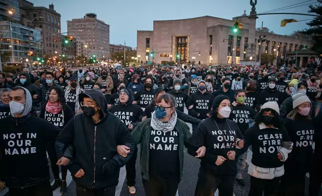 FILE - Protesters block traffic during a pro-Palestinian demonstration demanding a permanent cease-fire in Gaza, near the home of Sen. Chuck Schumer in the Brooklyn borough of New York, Tuesday, April 23, 2024. (AP Photo/Andres Kudacki, File)