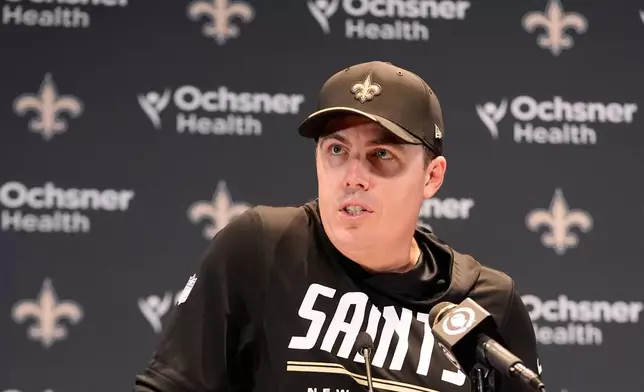 New Orleans Saints head coach Kellen Moore speaks at a news conference after an NFL football game against the Atlanta Falcons in New Orleans, Monday, Oct. 5, 2026. (AP Photo/Gerald Herbert)
