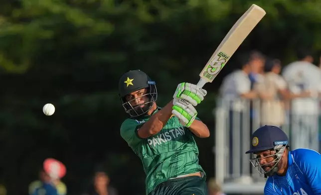 Pakistan's Hasan Nawaz plays a shot during the gold medal cricket match between India and Pakistan at the Asian Games in Nagoya, Japan, Saturday, Oct. 3, 2026. (AP Photo/Mark Baker)