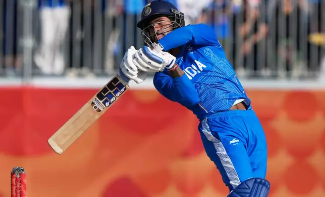 India's Tilak Verma plays a shot during the gold medal cricket match between India and Pakistan at the Asian Games in Nagoya, Japan, Saturday, Oct. 3, 2026. (AP Photo/Mark Baker)