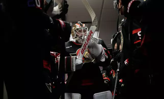 Ottawa Senators' Linus Ullmark walks to the ice before an NHL hockey game against the Philadelphia Flyers Saturday, Oct. 17, 2026, in Philadelphia. (AP Photo/Matt Slocum)