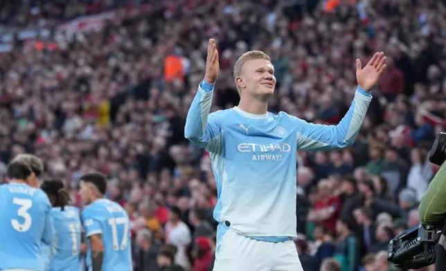 Manchester City's Erling Haaland celebrates after scoring his side's opening goal during the English Premier League soccer match between Liverpool and Manchester City in Liverpool, England, Sunday, Oct. 11, 2026. (AP Photo/Jon Super)