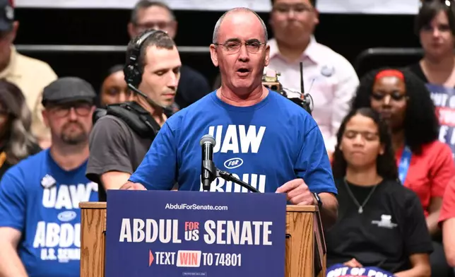 FILE - United Auto Workers President Shawn Fain addresses the crowd during a campaign rally for Michigan U.S. Senate candidate Abdul El-Sayed, July 18, 2026, in Detroit. (AP Photo/Jose Juarez, File)