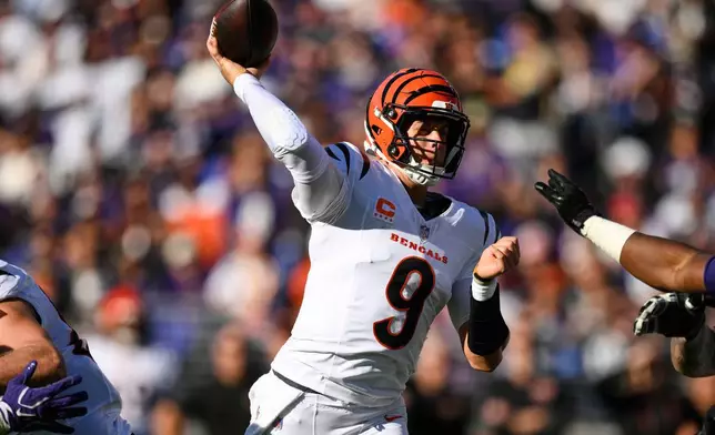 Cincinnati Bengals quarterback Joe Burrow (9) throws the ball during the second half of an NFL football game against the Baltimore Ravens in Baltimore, Sunday, Oct. 25, 2026. (AP Photo/Nick Wass)
