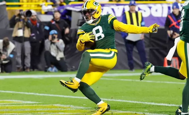 Green Bay Packers running back Josh Jacobs rushes for a touchdown during the first half of an NFL football game against the Carolina Panthers in Green Bay, Wis., Thursday, Oct. 29, 2026. (AP Photo/Mike Roemer)