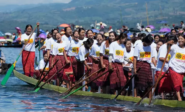 Ethnic Inthas celebrate during a traditional boat racing competition to mark Phaung Daw Oo pagoda festival on Inle Lake, southern Shan State, Myanmar, Friday, Oct. 16, 2026. (AP Photo/Thein Zaw)