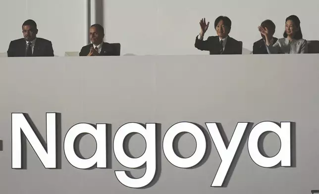 Crown Prince Akishino and Crown Princess Kiko wave the closing ceremony for the Asian Games in Nagoya, Japan, Sunday, Oct. 4, 2026. (AP Photo/Lee Jin-man)