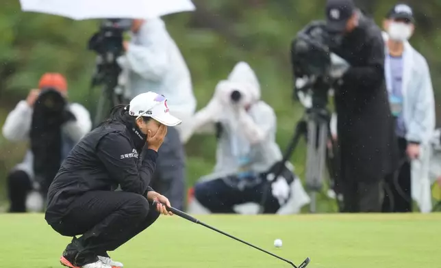 Hye-Jin Choi of South Korea reacts as she miss a putt at 18th hole during the final round of the LPGA BMW Ladies Championship at the Pine Beach Golf Links, in Haenam, South Korea, Sunday, Oct. 25, 2026. (AP Photo/Lee Jin-man)