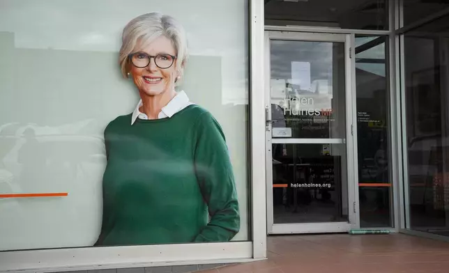 A photo of independent member of parliament Helen Haines is shown on the window of her electoral office in Wangaratta, Australia, Tuesday, Oct. 20, 2026. (James Ross/AAPImage via AP)