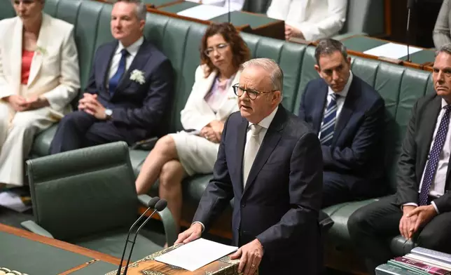 Australian Prime Minister Anthony Albanese pays tribute to independent lawmaker Helen Haines, who was critically injured on Oct. 19 when a driver struck her with a vehicle, at Parliament House in Canberra, Australia, Monday, Oct. 26, 2026. (Lukas Coch/AAP Image via AP)