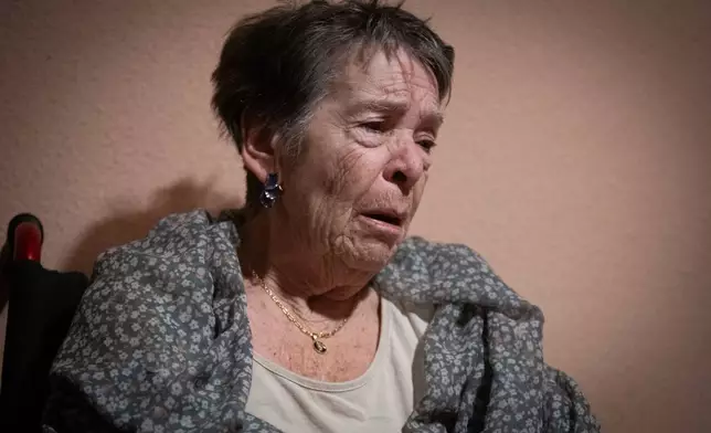 Maricarmen, 87, waits at home for police to arrive before being evicted from the home where she lived in Madrid, Spain, Wednesday, Sept. 23, 2026. (Fernando Sánchez/Europa Press via AP)