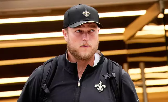 New Orleans Saints' Ryan Wright arrives at the reception pavilion of Charles de Gaulle airport in Roissy north of Paris, Monday, Oct. 19, 2026. (AP Photo/Teresa Suarez)