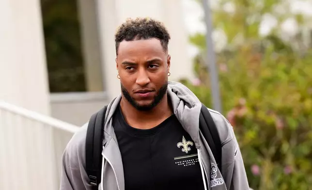 New Orleans Saints' Justin Reid arrives at the reception pavilion of Charles de Gaulle airport in Roissy north of Paris, Monday, Oct. 19, 2026. (AP Photo/Teresa Suarez)