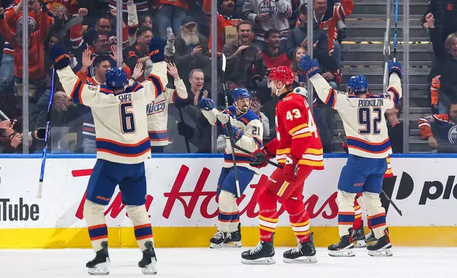 Edmonton Oilers' Mathieu Joseph (21) celebrates a goal against the Calgary Flames during the first period of an NHL hockey game in Edmonton, Wednesday, Oct. 28, 2026. (Codie McLachlan/The Canadian Press via AP)