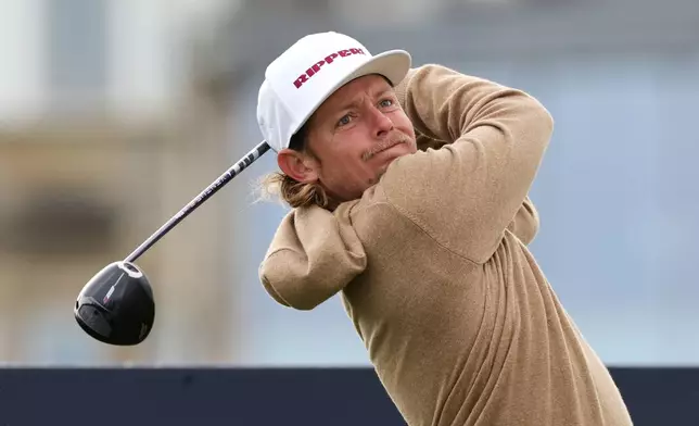 Cameron Smith of Australia tees off the 2nd on day three of the Dunhill Links Golf Championship in St Andrews, Scotland, Saturday, Oct. 3, 2026. (Steve Welsh/PA via AP)