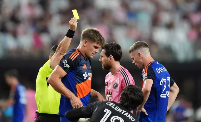 Inter Miami forward Lionel Messi (10) is shown a yellow card during the first half of an MLS soccer match, Wednesday, Oct. 28, 2026, in Miami. (AP Photo/Rebecca Blackwell)