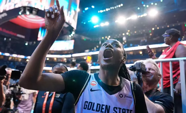 Golden State Valkyries guard Tiffany Hayes (15) talks to fans after Game 4 of the WNBA basketball finals against the Atlanta Dream on Saturday, Oct. 24, 2026, in Atlanta. (AP Photo/Brynn Anderson)