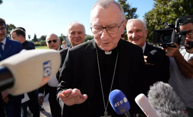 Vatican Secretary of State Pietro Parolin arrives to attend an international congress titled "Human Splendor: Preserving Fertility, Treating Infertility" at the Agostino Gemelli Polyclinic where Pope Leo XIV is hospitalised, in Rome, Friday, Oct. 16, 2026. (AP Photo/Gregorio Borgia)