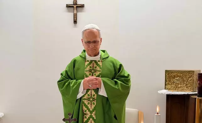 This picture, released by Vatican Media on Friday, Oct. 16, 2026, shows Pope Leo XIV celebrating Mass at the Agostino Gemelli Polyclinic in Rome, where he is recovering after having cancer removed from his right lung. (Vatican Media via AP)