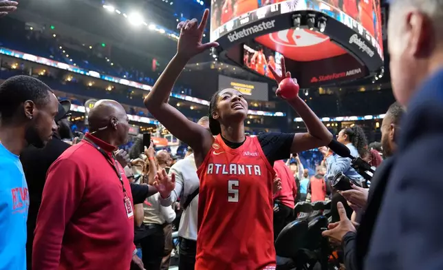 Atlanta Dream's Angel Reese reacts after the Dream won Game 6 of the WNBA basketball finals against the Golden State Valkyries on Thursday, Oct. 29, 2026, in Atlanta. (AP Photo/Brynn Anderson)