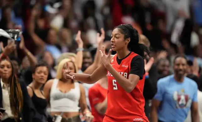 Atlanta Dream's Angel Reese reacts after scoring a three-pointer during the second half of Game 6 of the WNBA basketball finals against the Golden State Valkyries on Thursday, Oct. 29, 2026, in Atlanta. (AP Photo/Brynn Anderson)