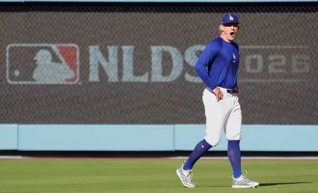 Los Angeles Dodgers pitcher Emmet Sheehan yawns during practice ahead of a baseball NL Division Series Thursday, Oct. 1, 2026, in Los Angeles. (AP Photo/Mark J. Terrill)