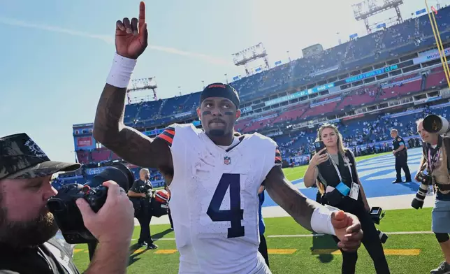 Cleveland Browns quarterback Deshaun Watson (4) celebrates as he leaves the field at the end of an NFL football game against the Tennessee Titans in Nashville, Tenn., Sunday, Oct. 25, 2026. (AP Photo/John Amis)
