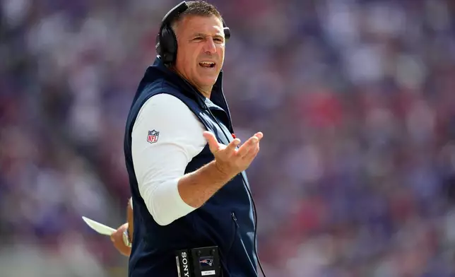 New England Patriots head coach Mike Vrabel reacts in the first half against the Buffalo Bills during an NFL football game in Orchard Park, N.Y., Sunday, Oct. 4, 2026. (AP Photo/Carolyn Kaster)
