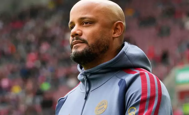 FILE - Bayern's head coach Vincent Kompany arrives for the German Bundesliga soccer match between FC Augsburg and FC Bayern Munich in Augsburg, Germany, Oct. 10, 2026. (AP Photo/Matthias Schrader, File)