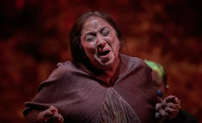 Flamenco singer Montse Cortés performs on a stage during a concert organized as part of the Seville Flamenco Bienal in Seville, Spain, Thursday, Sept. 17, 2026. (AP Photo/Emilio Morenatti)