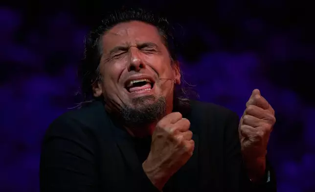 Flamenco singer Jose Angel Carmona performs on a stage during a concert organized as part of the Seville Flamenco Bienal in Seville, Spain, Friday, Sept. 18, 2026. (AP Photo/Emilio Morenatti)
