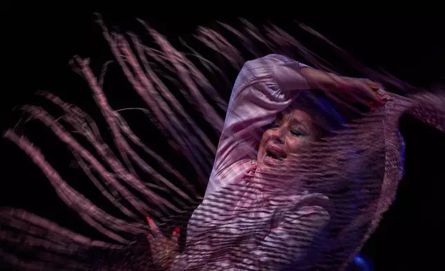 Flamenco singer Mara Rey performs on a stage during a concert organized as part of the Seville Flamenco Bienal in Seville, Spain, Thursday, Sept. 17, 2026. (AP Photo/Emilio Morenatti)