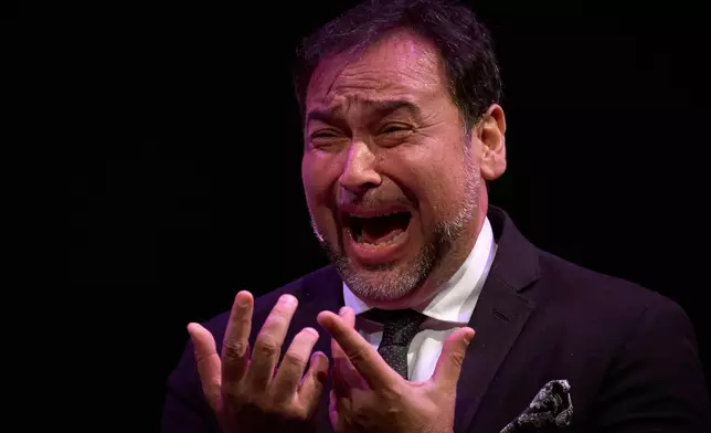 Flamenco singer Jose Valencia performs on a stage during a concert organized as part of the Seville Flamenco Bienal in Seville, Spain, Thursday, Sept. 24, 2026. (AP Photo/Emilio Morenatti)