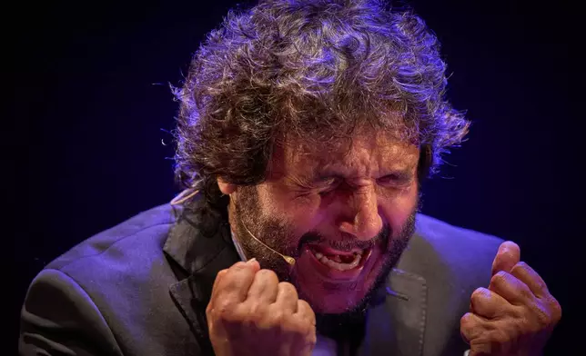 Flamenco singer Antonio Reyes performs on a stage during a concert organized as part of the Seville Flamenco Bienal in Seville, Spain, Friday, Sept. 18, 2026. (AP Photo/Emilio Morenatti)