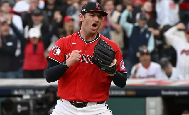Cleveland Guardians starting pitcher Gavin Williams celebrates after completing the top of the fourth inning of Game 2 of baseball's American League Division Series against the Chicago White Sox, Monday, Oct. 5, 2026, in Cleveland. (AP Photo/Phil Long)