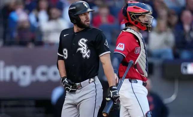 Chicago White Sox's Tristan Peters, left, reacts after striking out during the second inning of Game 2 of baseball's American League Division Series against the Cleveland Guardians, Monday, Oct. 5, 2026, in Cleveland. (AP Photo/Sue Ogrocki)
