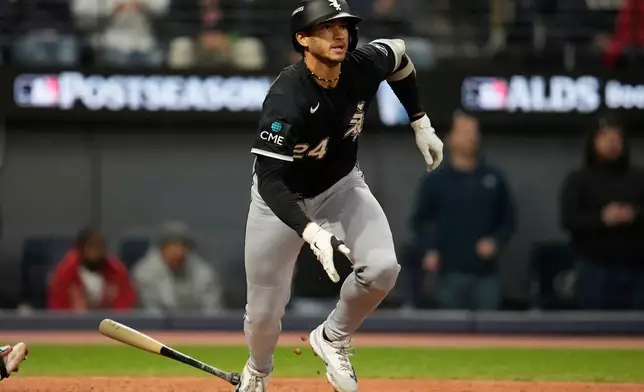 Chicago White Sox's Braden Montgomery (24) watches his 2-run double during the sixth inning of Game 2 of baseball's American League Division Series against the Cleveland Guardians, Monday, Oct. 5, 2026, in Cleveland. (AP Photo/Sue Ogrocki)