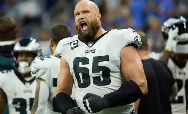 FILE - Philadelphia Eagles offensive tackle Lane Johnson (65) reacts on the sideline during an NFL football game against the Detroit Lions, Sept. 11, 2022, in Detroit. (AP Photo/Rick Osentoski, File)