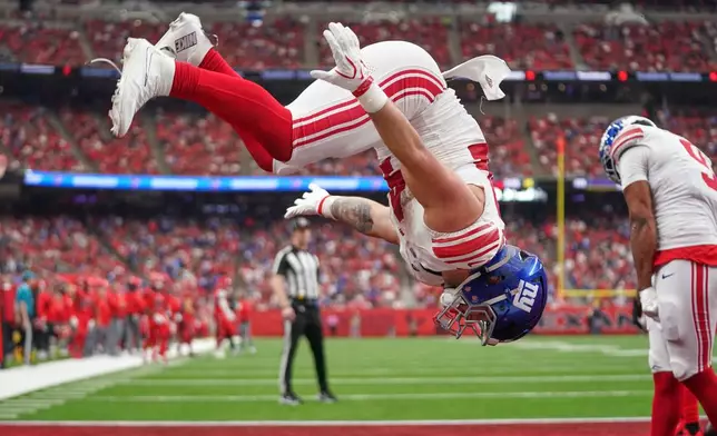 New York Giants running back Cam Skattebo celebrates in the end zone after his touchdown during the second half of an NFL football game against the Houston Texans in Houston, Sunday, Oct. 25, 2026. (AP Photo/Eric Smith)