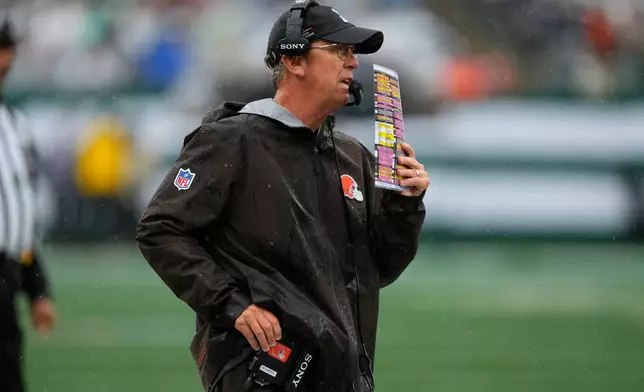 Cleveland Browns head coach Todd Monken watches from the sideline during the first half of an NFL football game against the New York Jets, Sunday, Oct. 11, 2026, in East Rutherford, N.J. (AP Photo/Yuki Iwamura)