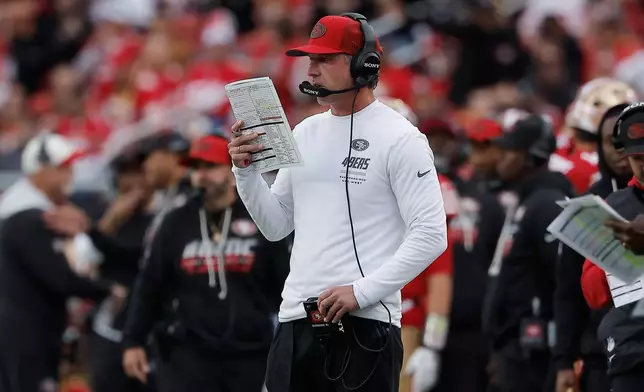 San Francisco 49ers head coach Kyle Shanahan stands on the sideline during the first half of an NFL football game against the Washington Commanders in Santa Clara, Calif., Monday, Oct. 19, 2026. (AP Photo/Kelley L. Cox)