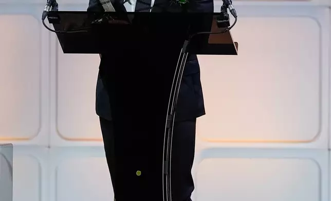 Lyle Lovett speaks as he is inducted into the Nashville Songwriters Hall of Fame Gala on Monday, Oct. 26, 2026, at the Music City Center in Nashville, Tenn. (AP Photo/George Walker IV)